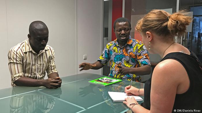 Derek Sarfo-Yiadom (left) and Kofi Sarpong Adu-Manu discuss their research as part of the DEMIS program