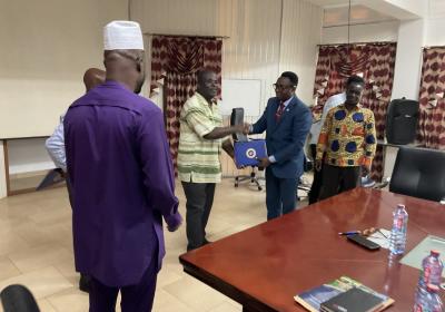 Prof. William Koomson, Vice Chancellor of VVU Left and Prof. Charles Tortor Director of Food Research Institute of CSIR Right In a Hand Shake After Signing The MOU